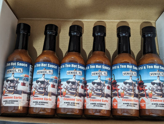 6 pack of First & Ten original Cayenne Garlic Hot Sauce 5oz Bottles.